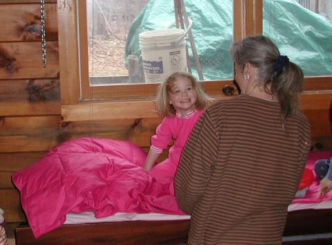 A pink bed!  Just what she wanted.