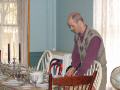 Robert sets the table